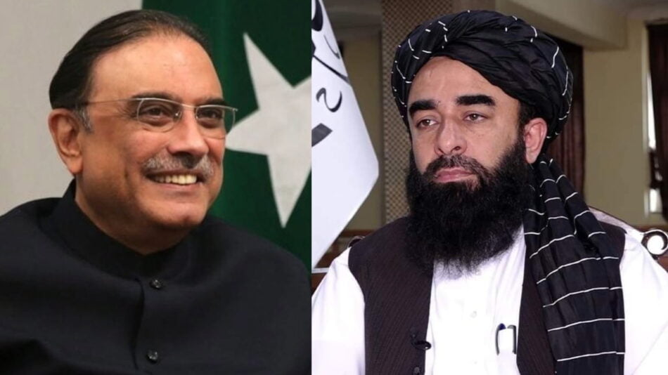 The image shows the spokesperson of the Islamic Emirate of Afghanistan, Zabihullah Mujahid, on the right, and a portrait of Pakistan's new president, Asif Ali Zardari, on the left.